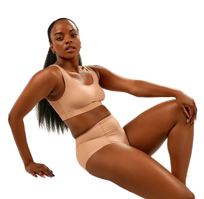 Woman seated in activewear